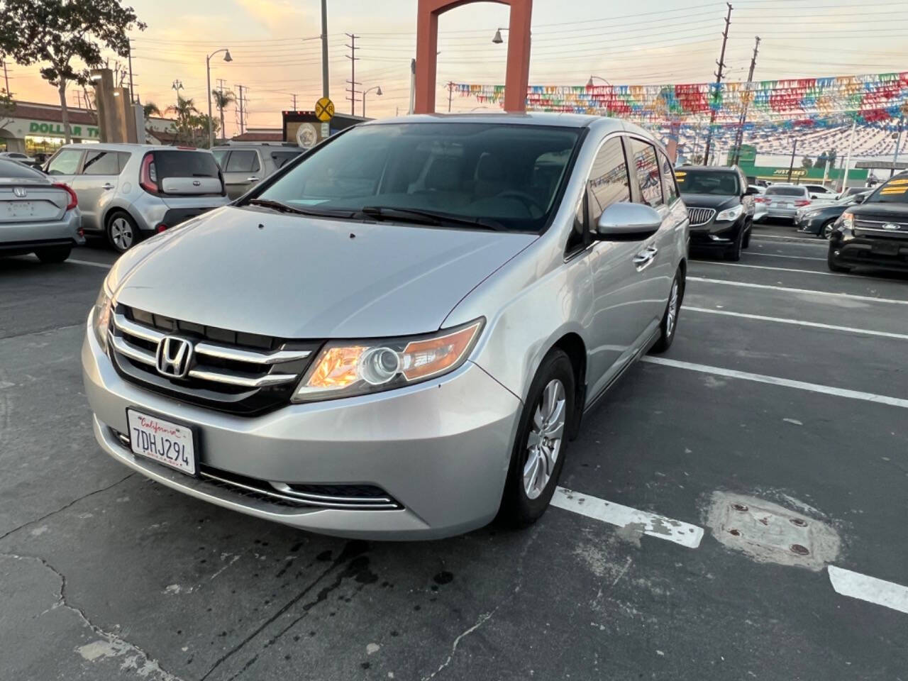 2014 Honda Odyssey for sale at Unique Auto Sales, Inc. in Bell, CA