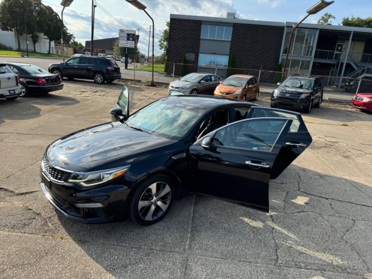 2019 Kia Optima for sale at First Class Auto Mall in Akron, OH