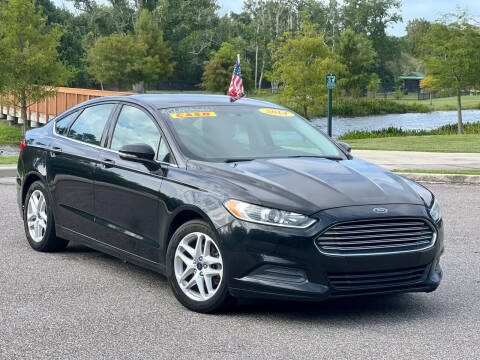 2014 Ford Fusion for sale at EASYCAR GROUP in Orlando FL