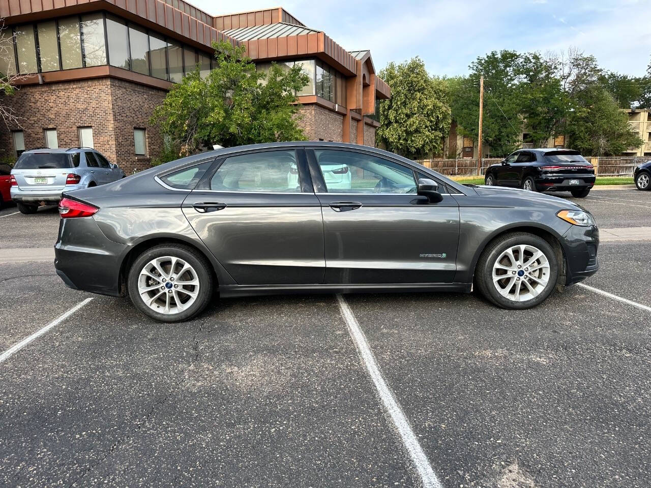 2019 Ford Fusion Hybrid for sale at AMZ Autos, LLC in Denver, CO