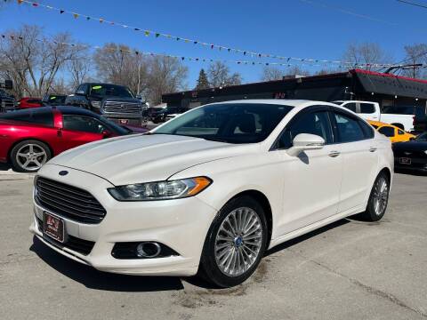 2013 Ford Fusion for sale at A & J AUTO SALES in Eagle Grove IA