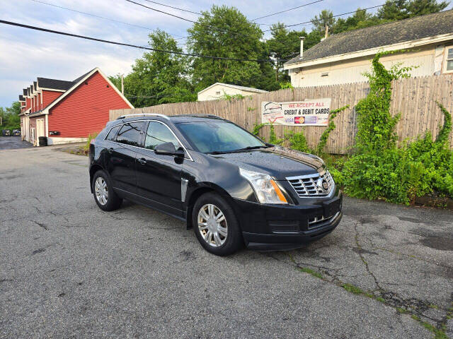 2013 Cadillac SRX for sale at PAKLAND AUTO SALES in Auburn, MA