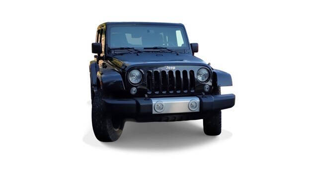 2014 Jeep Wrangler Unlimited for sale at Bowman Auto Center in Clarkston, MI