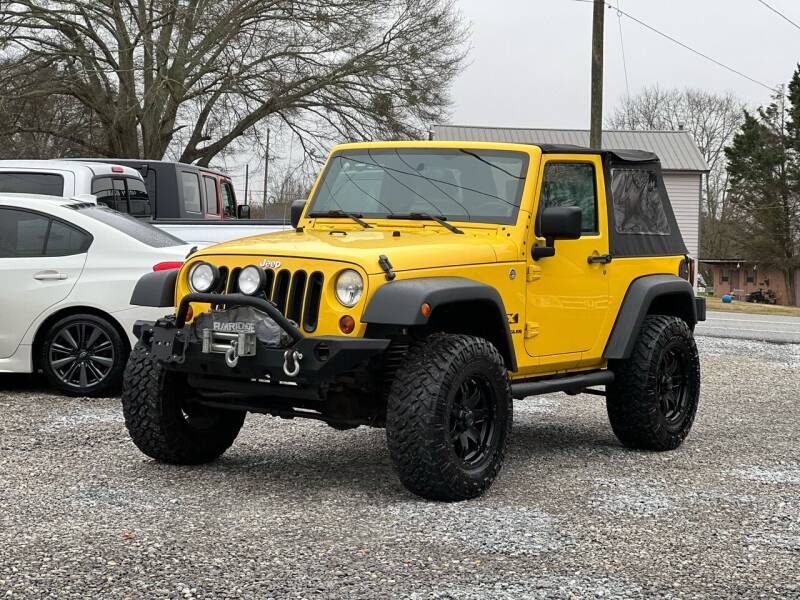 2009 Jeep Wrangler for sale at H and S Auto Group in Canton GA