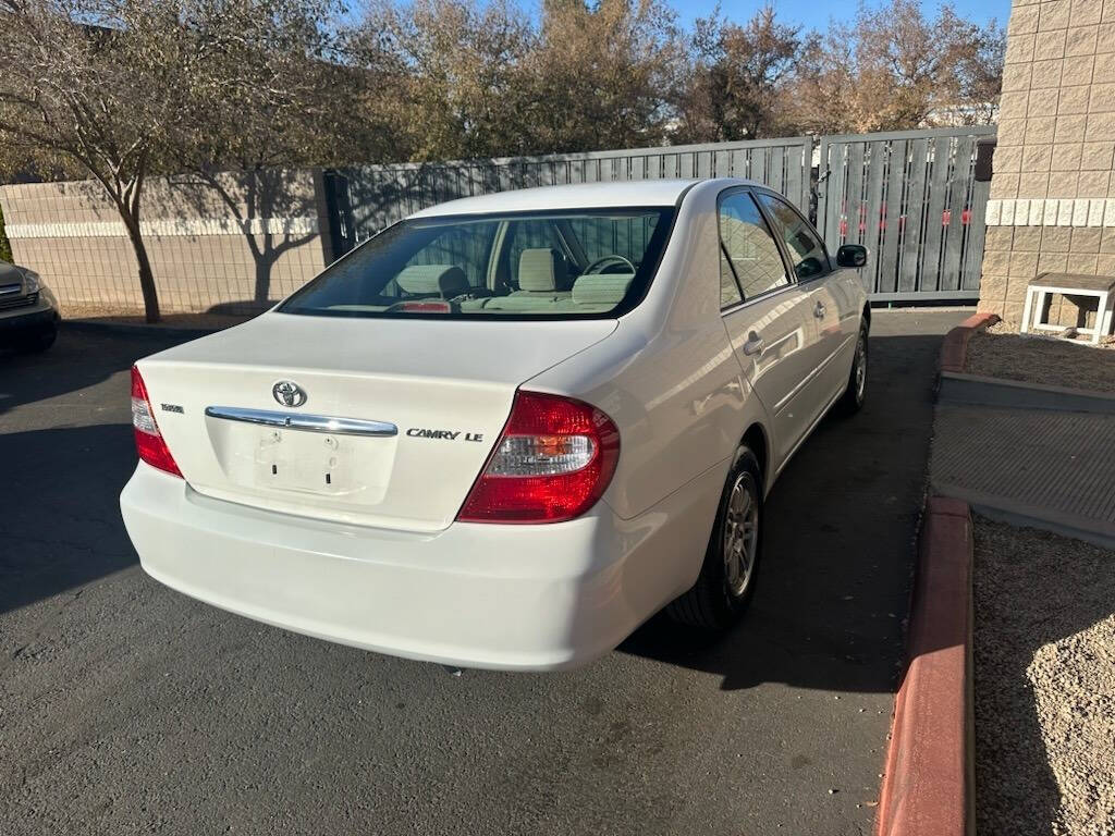 2002 Toyota Camry for sale at HUDSONS AUTOS in Gilbert, AZ