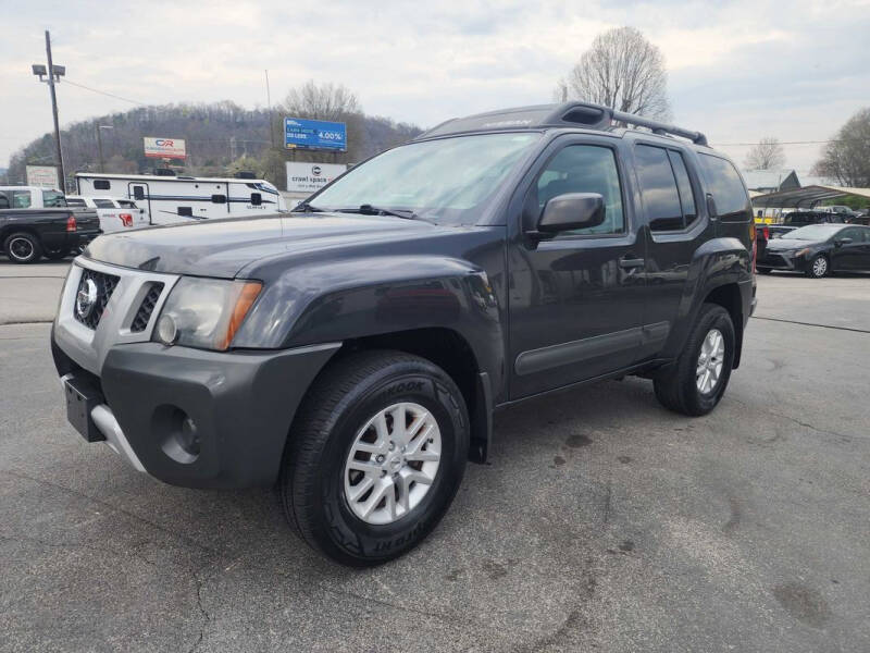 2014 Nissan Xterra for sale at MCMANUS AUTO SALES in Knoxville TN