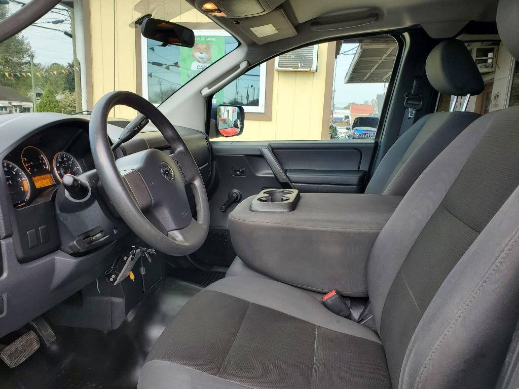 2011 Nissan Titan for sale at DAGO'S AUTO SALES LLC in Dalton, GA