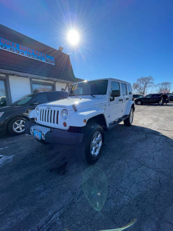 2011 Jeep Wrangler Unlimited for sale at VELAZQUEZ AUTO SALES in Aurora IL