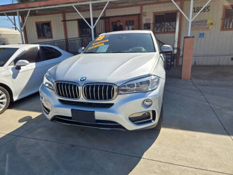 2019 BMW X6 for sale at E and M Auto Sales in Bloomington CA