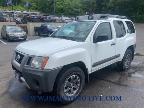 2014 Nissan Xterra for sale at J & M Automotive in Naugatuck CT