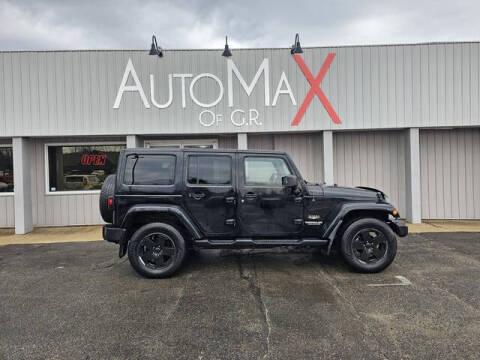 2012 Jeep Wrangler Unlimited for sale at Auto Max of GR in Comstock Park MI