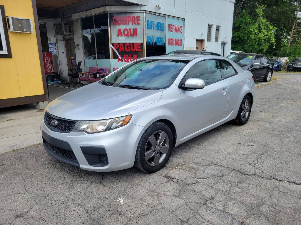 2010 Kia Forte Koup for sale at DAGO'S AUTO SALES LLC in Dalton, GA