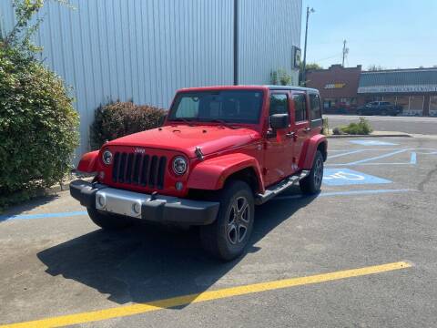 2014 Jeep Wrangler Unlimited for sale at DAVENPORT MOTOR COMPANY in Davenport WA