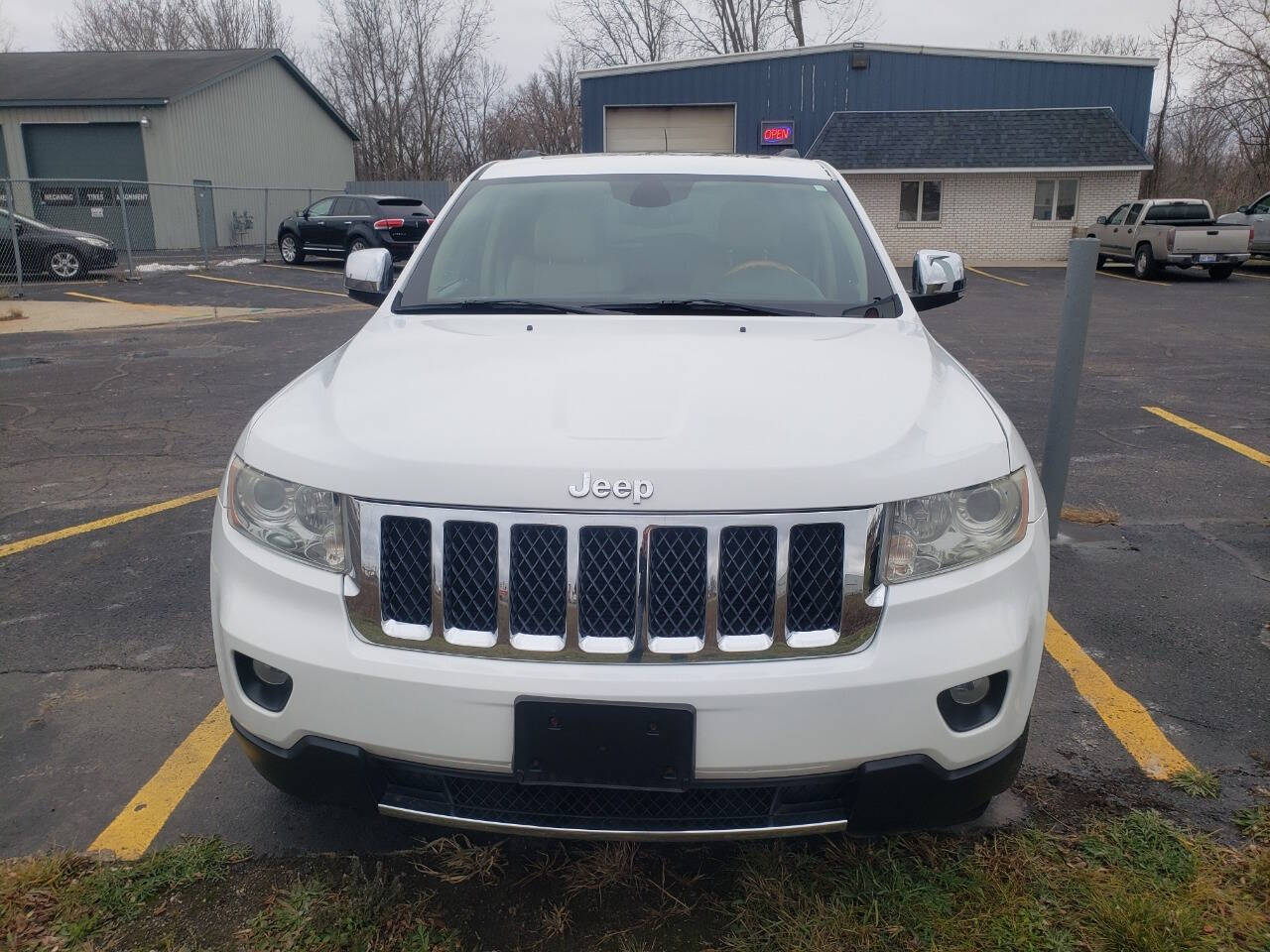 2013 Jeep Grand Cherokee for sale at Platinum Motors in Holland, MI