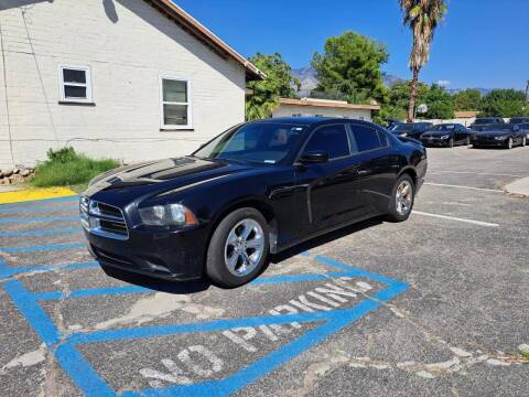 2014 Dodge Charger for sale at RN AUTO GROUP in San Bernardino CA