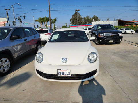 2012 Volkswagen Beetle for sale at E and M Auto Sales in Bloomington CA