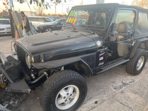 2000 Jeep Wrangler for sale at SCOTT HARRISON MOTOR CO in Houston TX