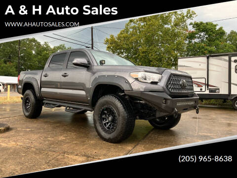 2018 Toyota Tacoma for sale at A & H Auto Sales in Clanton AL