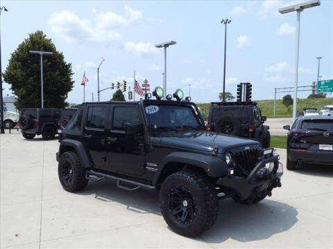 2016 Jeep Wrangler Unlimited for sale at SIMOTES MOTORS in Minooka IL