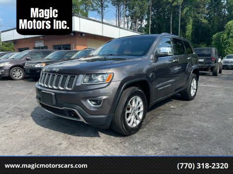 2014 Jeep Grand Cherokee for sale at Magic Motors Inc. in Snellville GA