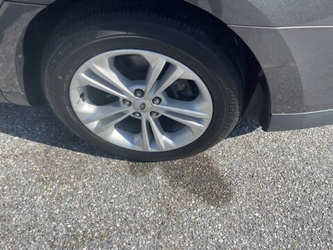 2015 Ford Taurus for sale at FIVE FRIENDS AUTO in Wilmington DE