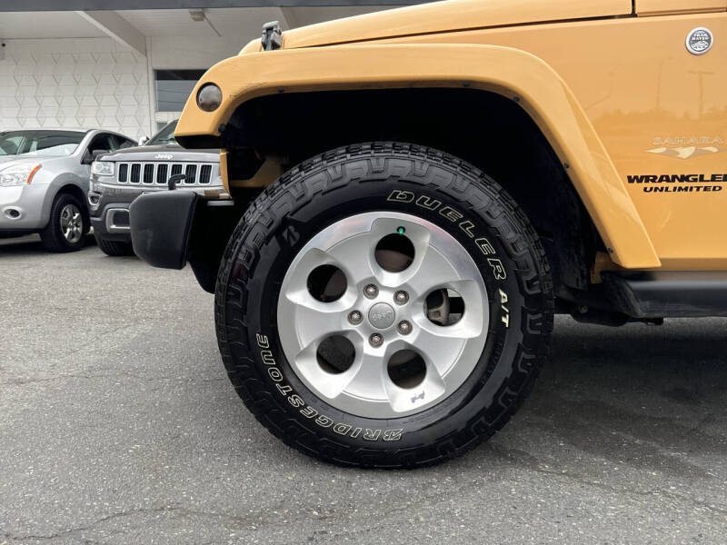 Used 2013 Jeep Wrangler Unlimited Sahara with VIN 1C4BJWEG1DL616891 for sale in Edmonds, WA