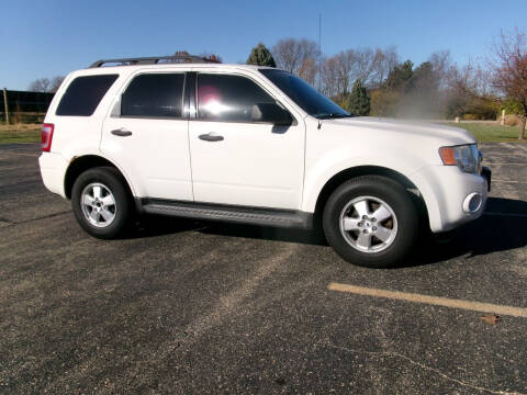 2009 Ford Escape for sale at Crossroads Used Cars Inc. in Tremont IL