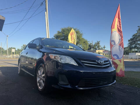 2013 Toyota Corolla for sale at CENTURY AUTO SALES in Orlando FL
