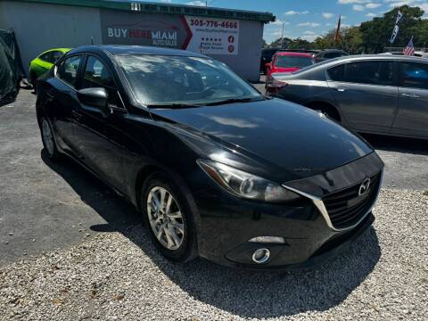 2014 Mazda MAZDA3 for sale at Buy Here Miami Auto Sales in Miami FL