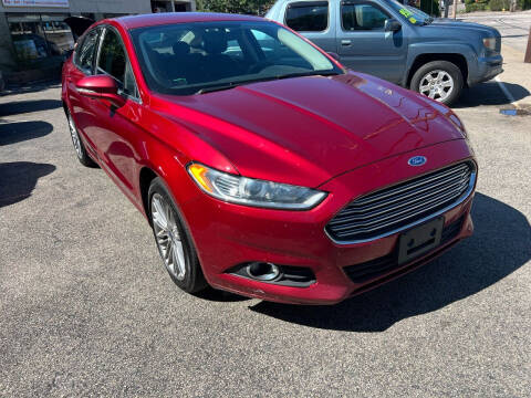 2014 Ford Fusion for sale at Charlie's Auto Sales in Quincy MA