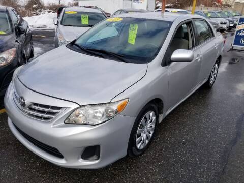 2013 Toyota Corolla for sale at Howe's Auto Sales in Lowell MA