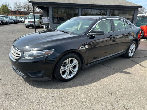 2015 Ford Taurus for sale at Diana Rico LLC in Dalton GA