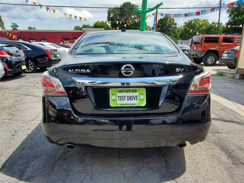 2015 Nissan Altima for sale at DAGO'S AUTO SALES LLC in Dalton, GA