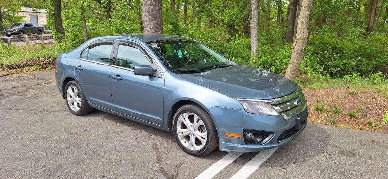 2012 Ford Fusion for sale at TURN KEY AUTO SALES in Lakewood NJ