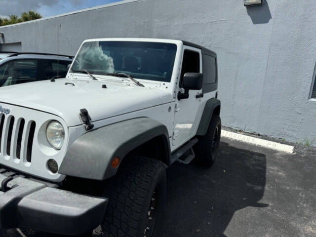 2011 Jeep Wrangler for sale at Amico Auto Sales in Margate, FL