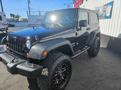 2013 Jeep Wrangler for sale at Unique Auto Center in Oxnard CA