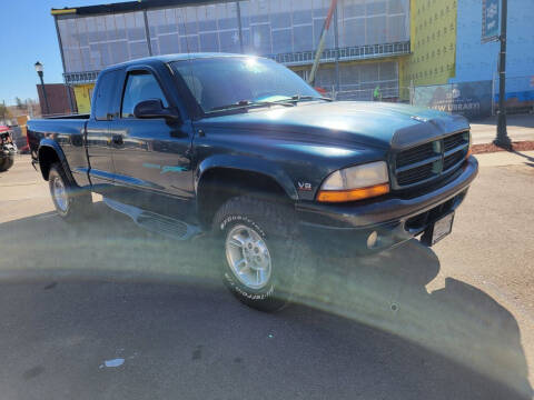 1998 Dodge Dakota for sale at BERKENKOTTER MOTORS in Brighton CO