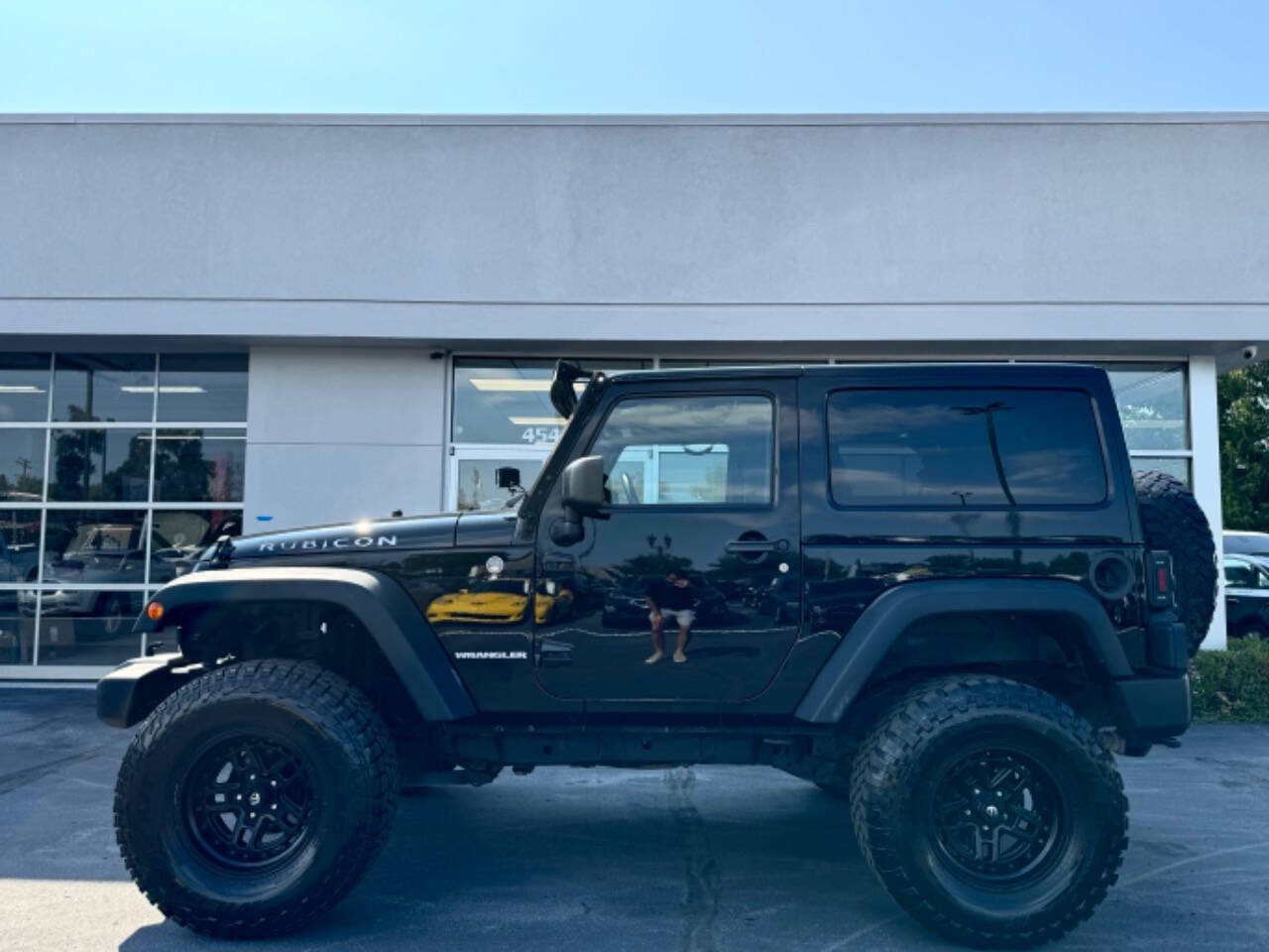 2012 Jeep Wrangler for sale at Opus Motorcars in Utica, MI