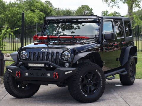 2015 Jeep Wrangler Unlimited for sale at Texas Auto Corporation in Houston TX