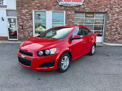2014 Chevrolet Sonic for sale at Ohio Car Mart in Elyria OH