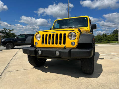 2015 Jeep Wrangler for sale at A&C Auto Sales in Moody AL
