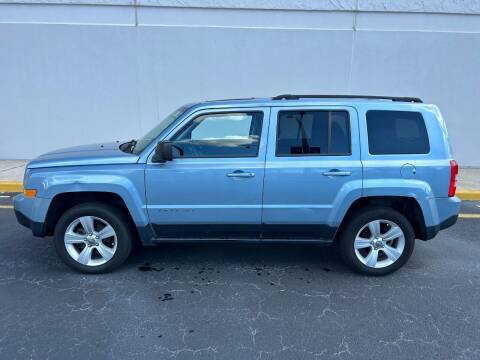 2013 Jeep Patriot for sale at CYBER CAR STORE in Tampa FL