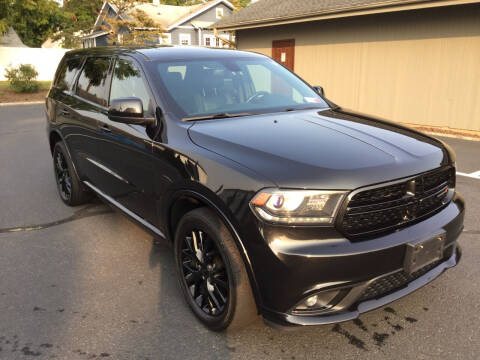 2015 Dodge Durango for sale at International Motor Group LLC in Hasbrouck Heights NJ