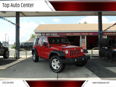 2012 Jeep Wrangler Unlimited for sale at Top Auto Center in Quakertown PA