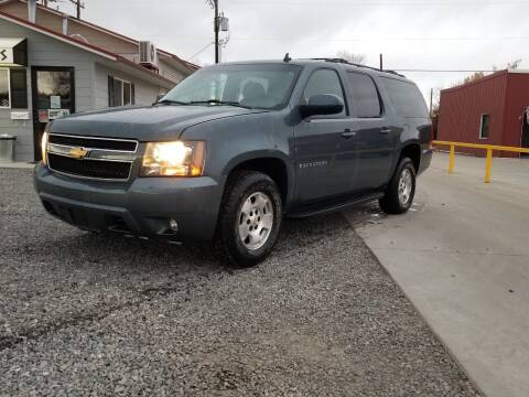 2009 Chevrolet Suburban for sale at KHAN'S AUTO LLC in Worland WY
