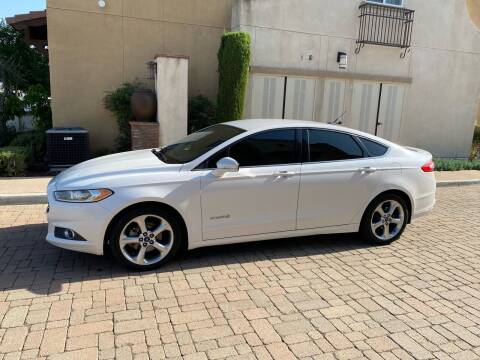 2013 Ford Fusion Hybrid for sale at California Motor Cars in Covina CA