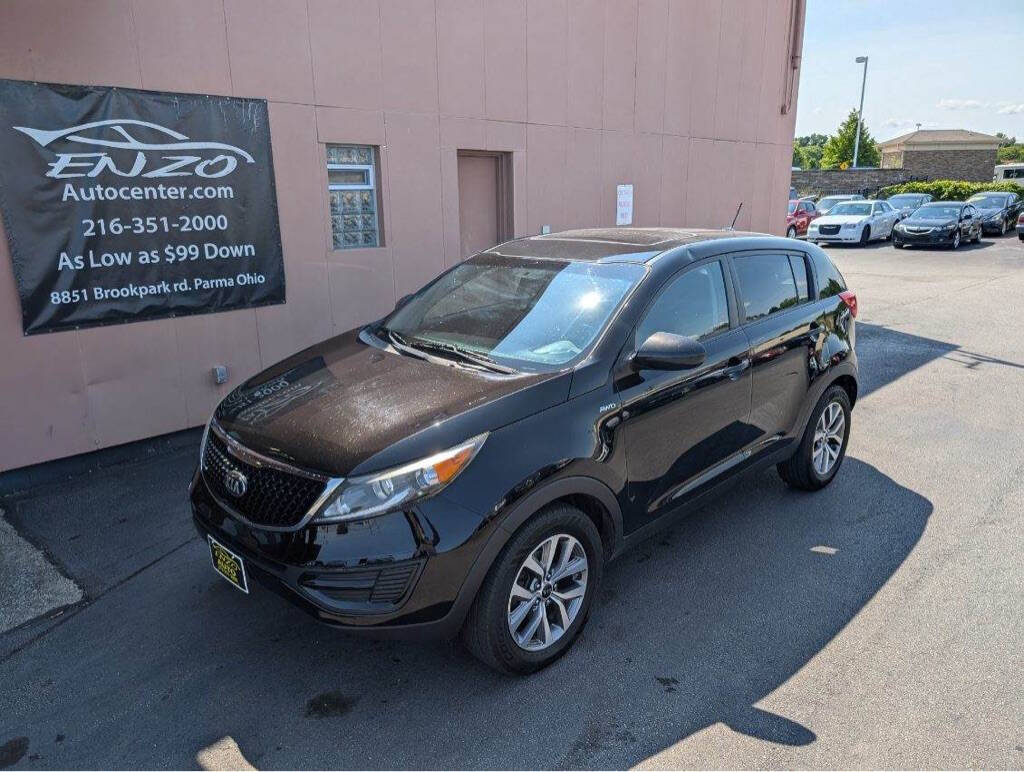 2014 Kia Sportage for sale at ENZO AUTO in Parma, OH