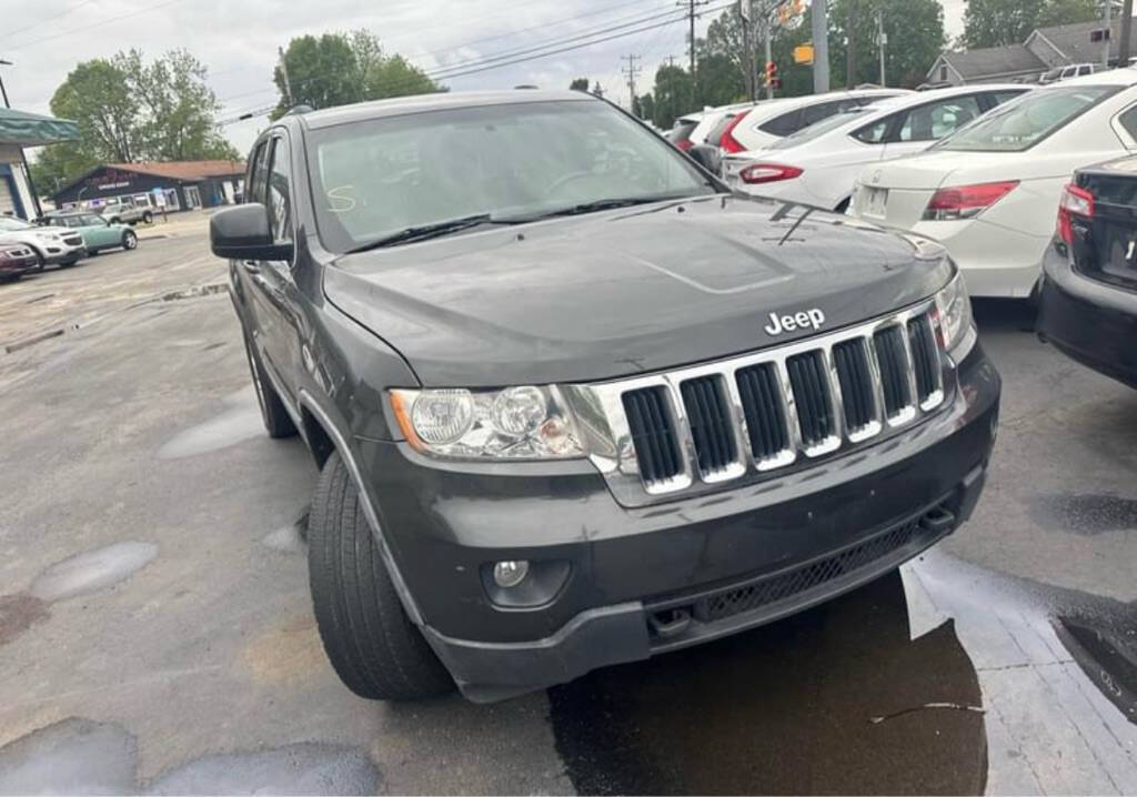 2011 Jeep Grand Cherokee for sale at CASTLE MOTORS in New Castle, IN