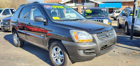 2005 Kia Sportage for sale at Means Auto Sales in Abington MA