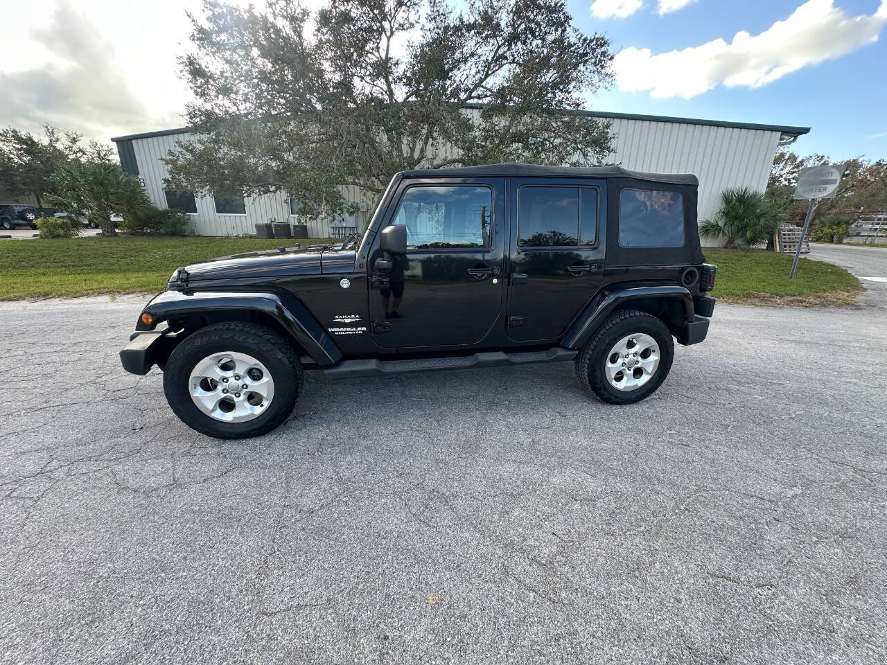 2013 Jeep Wrangler Unlimited for sale at Rubi Motorsports in Sarasota, FL